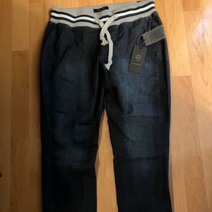 Poetic justice jogger jeans. Never worn. NEW!